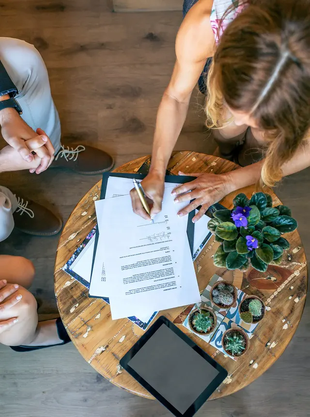 Reviewing estate planning documents at a table